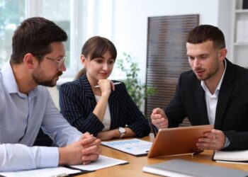 EY urges junior staff back to the office as AI puts a premium on human skills