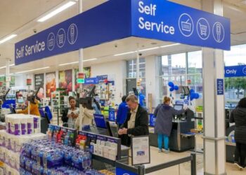 Tesco raises profit forecast and lifts share buyback to £950m