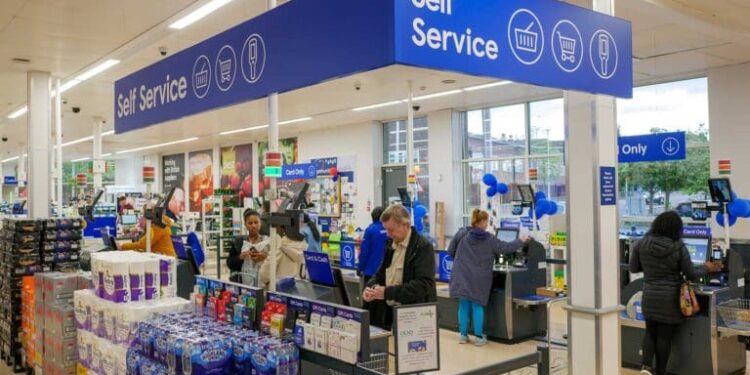 Tesco raises profit forecast and lifts share buyback to £950m